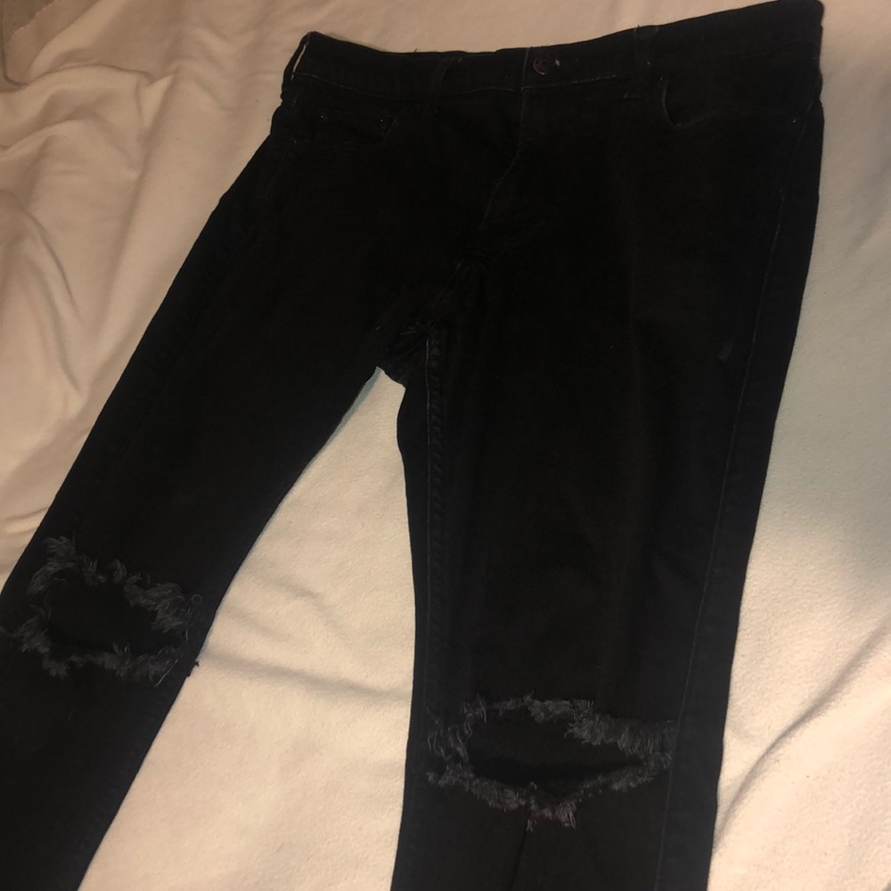 Hollister black jeans with holes in the knees